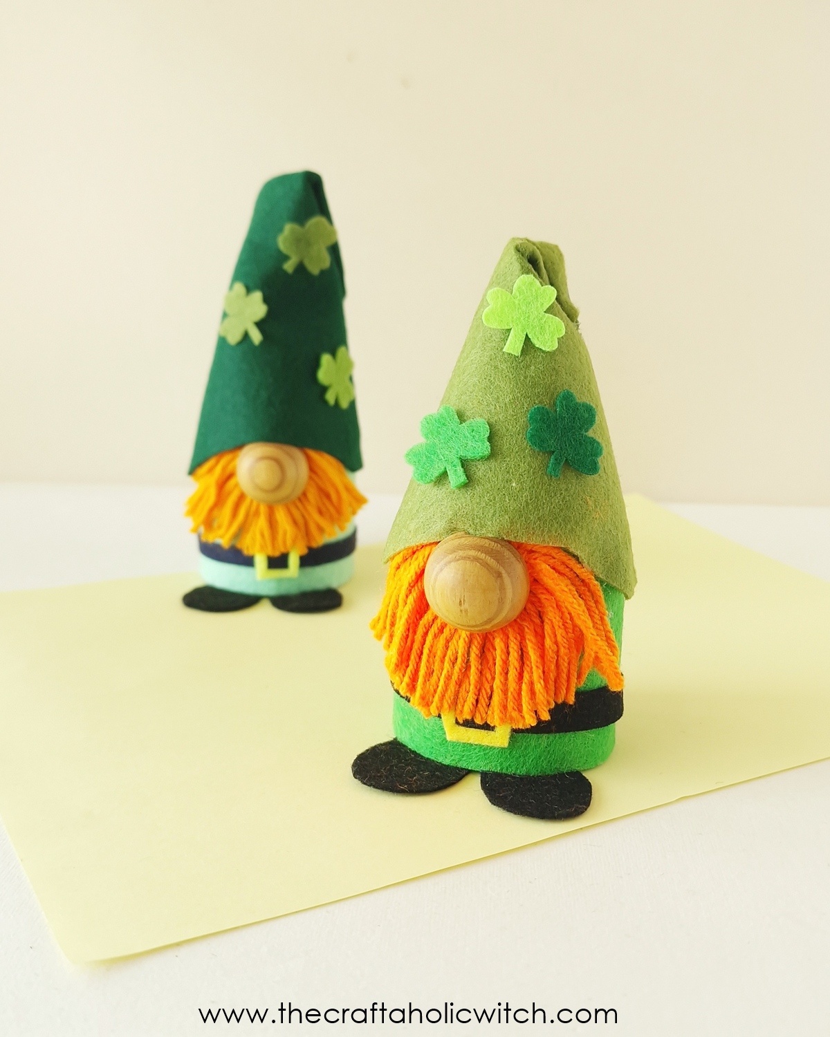 Easy Toilet Paper Roll Gnome for St. Patrick’s Day (Free Pattern + Video) 14 Toilet paper roll gnome craft for St. Patrick's Day with a felt hat and yarn beard