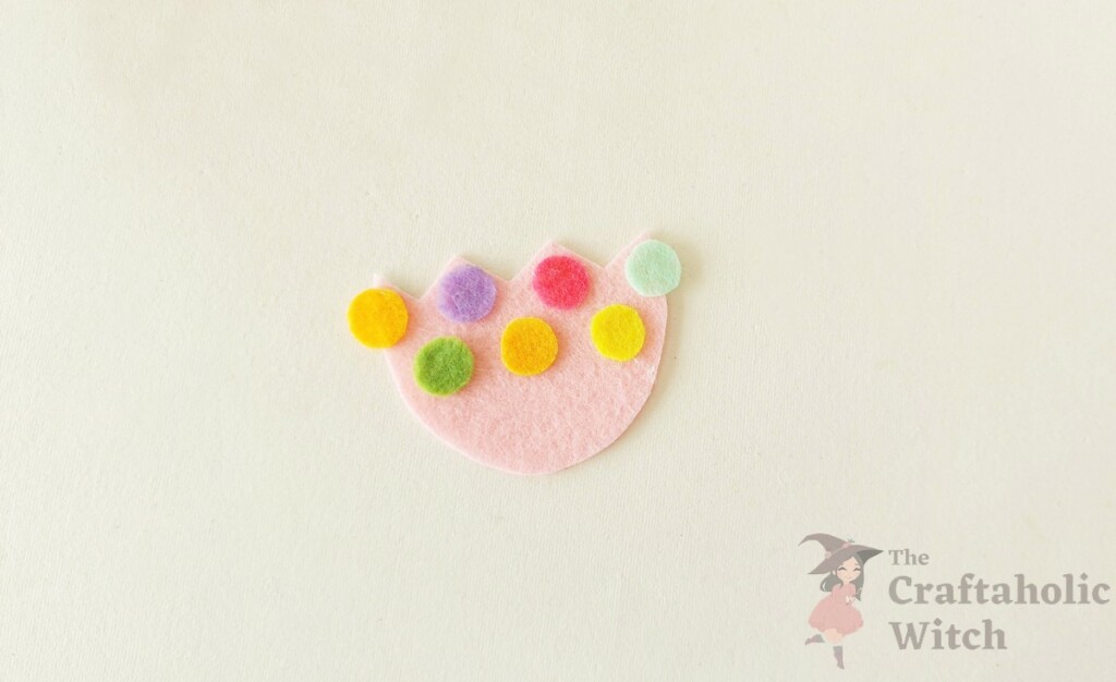 How to Make a Felt Easter Egg Pouch (With Free Template) 5 Cracked front and back pieces of felt Easter egg pouch before stitching