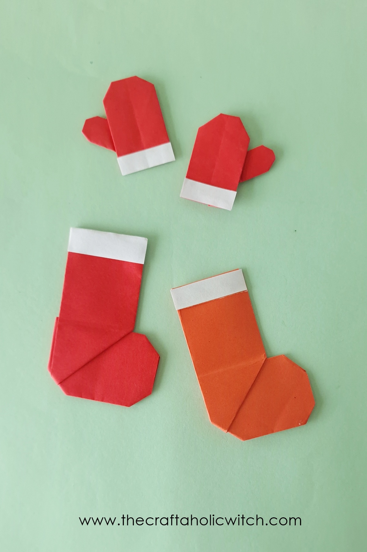 In this tutorial, we'll show you how to create adorable origami gloves and stockings that transform simple paper into charming Christmas decorations. 