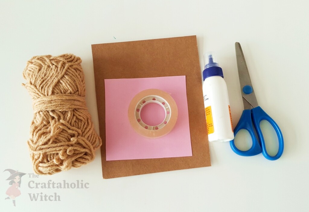 Hedgehog craft supplies including cardstock, yarn, scissors, glue, and craft paper for kids activity