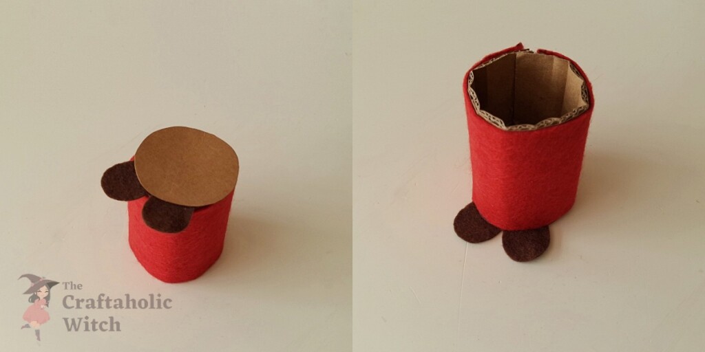 Felt shoes attached to bottom of gnome body with round cardboard base glued on