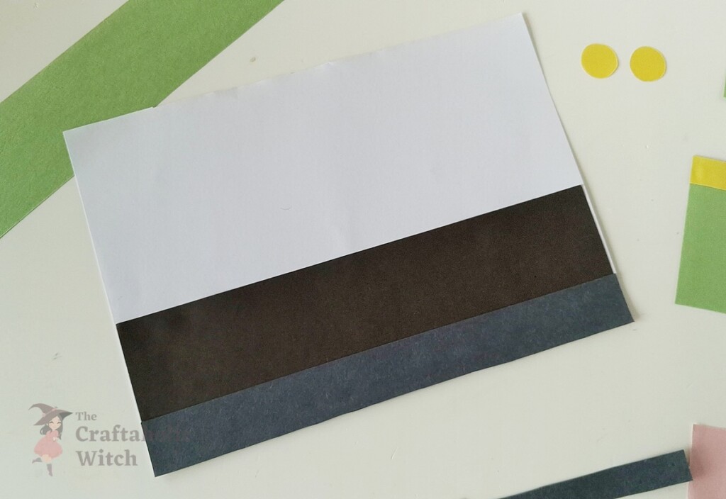 How to Make a Paper Nutcracker Doll (Free Template + Video Tutorial) 5 Step 4: Glue Pants and Boots to the Base