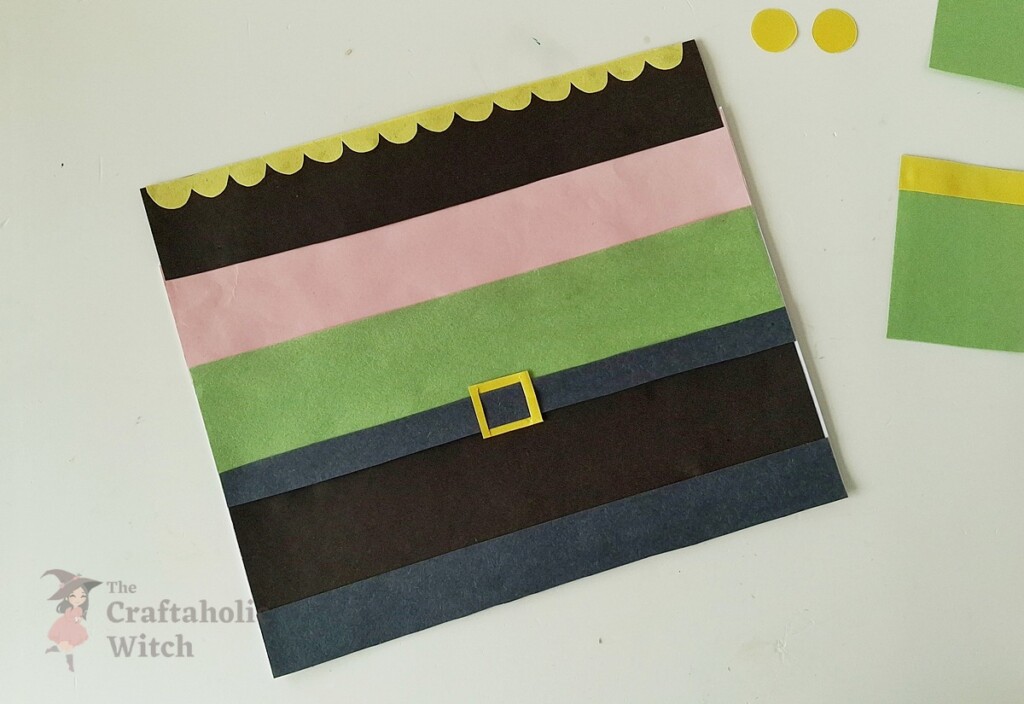 How to Make a Paper Nutcracker Doll (Free Template + Video Tutorial) 8 Step 7: Glue the Hat to the Head